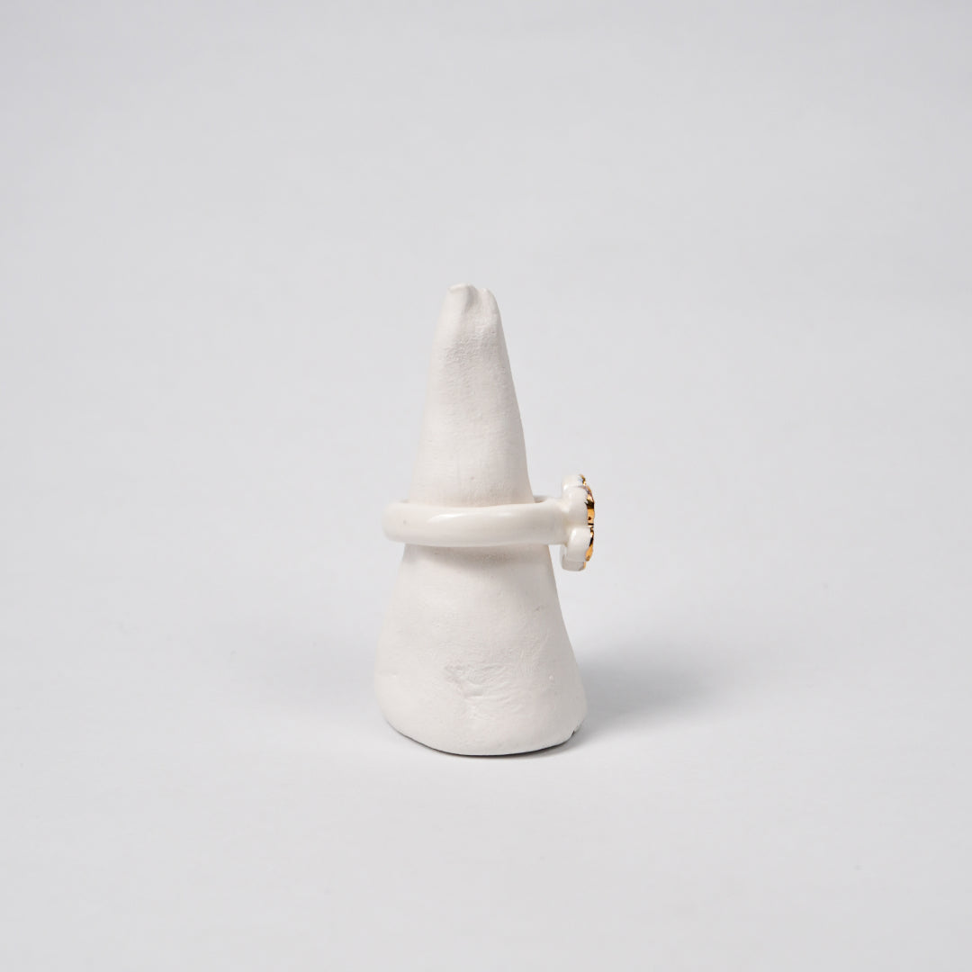 queen-s-gambit-legal-edition-with-24k-gold-ceramic-ring-Leap-And-Linger-Product-Rings-by-Nomi-Bui-With-Stand-2nd-Angle