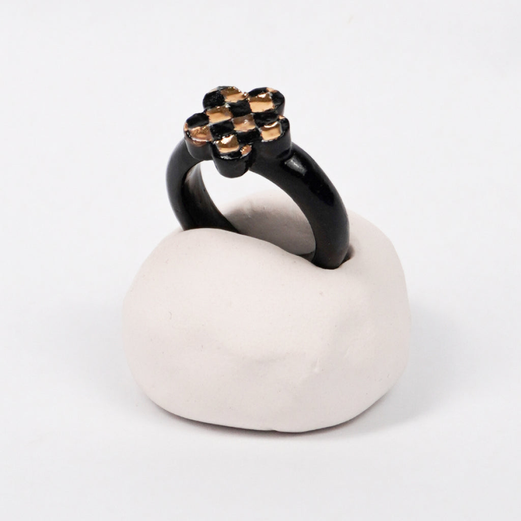 queen-s-gambit-sicilia-edition-with-24k-gold-ceramic-ring-Leap-And-Linger-Product-Rings-by-Nomi-Bui-With-Hand-1st-Angle