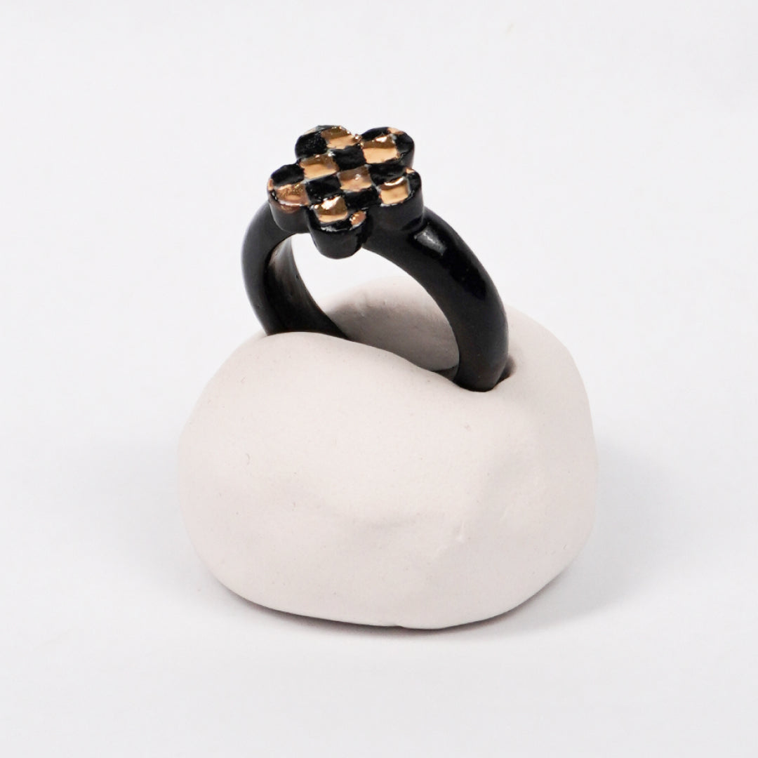queen-s-gambit-sicilia-edition-with-24k-gold-ceramic-ring-Leap-And-Linger-Product-Rings-by-Nomi-Bui-With-Hand-1st-Angle