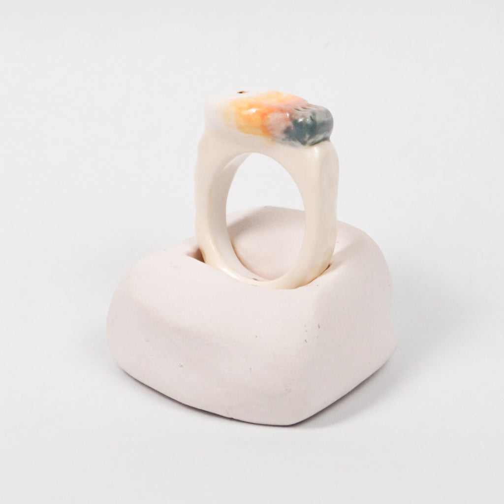 taiyaki-golden-spice-edition-with-24k-gold-ceramic-ring-Leap-And-Linger-Product-Rings-by-Nomi-Bui-With-Hand-1st-Angle