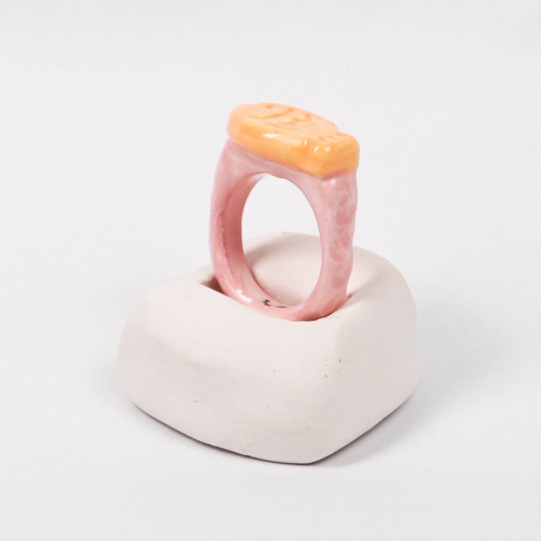 taiyaki-pink-marshmallow-porcelain-ring-Leap-And-Linger-Product-Rings-by-Nomi-Bui-With-Hand-1st-Angle
