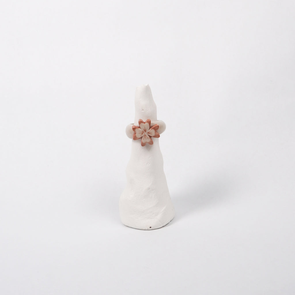 terra-vitae-soles-ceramic-ring-Leap-And-Linger-Product-Rings-by-Nomi-Bui-With-Stand-1st-Angle