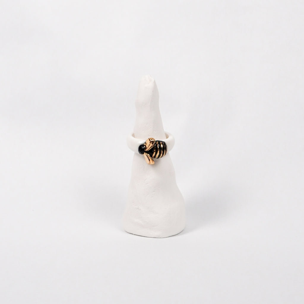 the-endless-flower-garden-bee-edition-with-24k-gold-porcelain-ring-Leap-And-Linger-Product-Rings-by-Nomi-Bui-With-Stand-1st-Angle