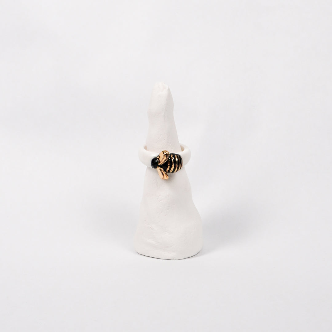 the-endless-flower-garden-bee-edition-with-24k-gold-porcelain-ring-Leap-And-Linger-Product-Rings-by-Nomi-Bui-With-Stand-1st-Angle