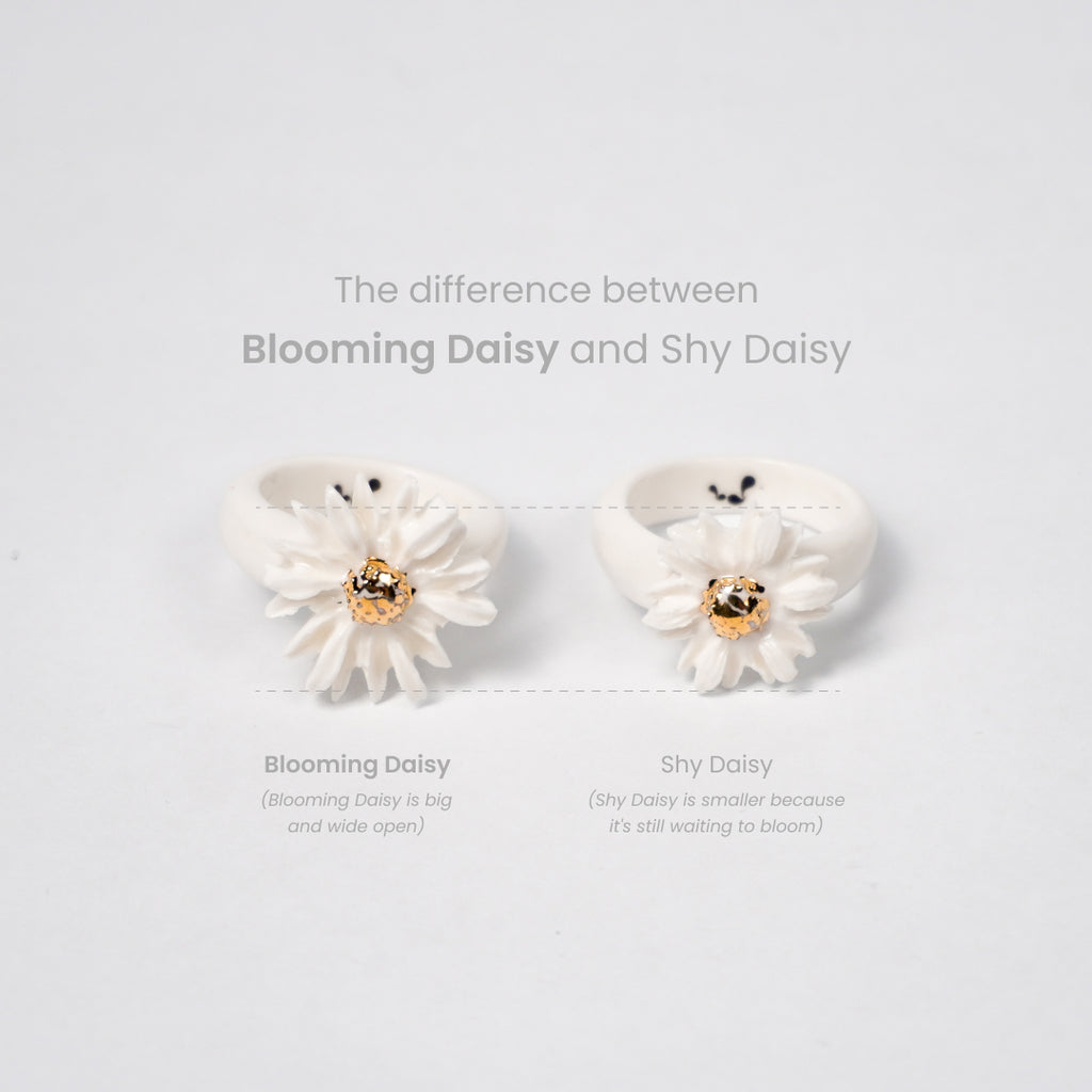 the-endless-flower-garden-blooming-daisy-edition-with-24k-gold-ceramic-ring-Leap-And-Linger-Product-Rings-by-Nomi-Bui-With-Hand-1st-Angle
