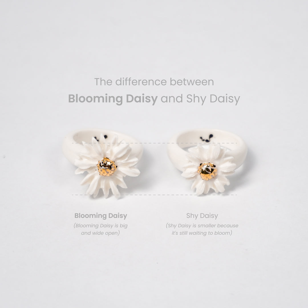the-endless-flower-garden-blooming-daisy-edition-with-24k-gold-ceramic-ring-Leap-And-Linger-Product-Rings-by-Nomi-Bui-With-Hand-1st-Angle