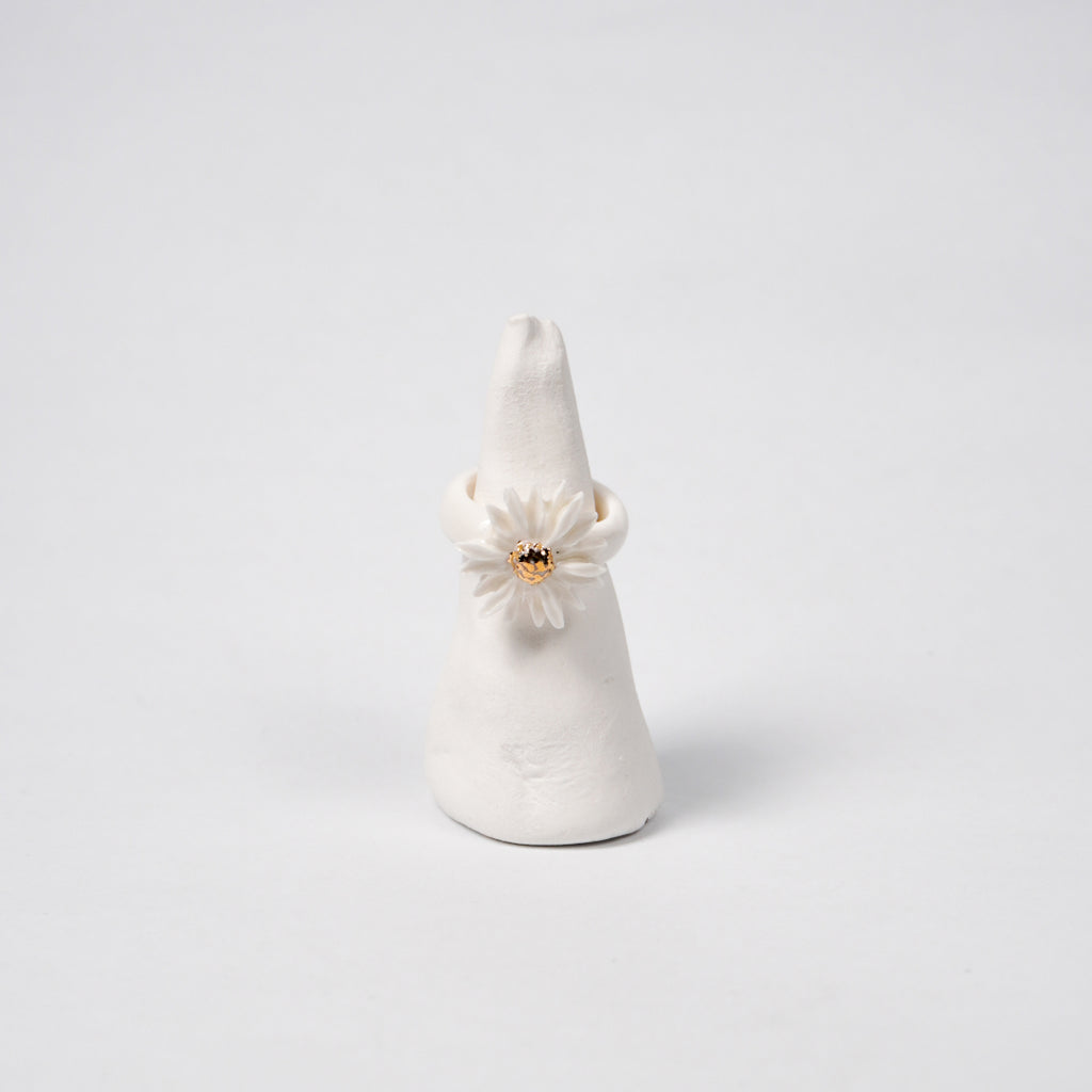 the-endless-flower-garden-blooming-daisy-edition-with-24k-gold-ceramic-ring-Leap-And-Linger-Product-Rings-by-Nomi-Bui-With-Stand-1st-Angle