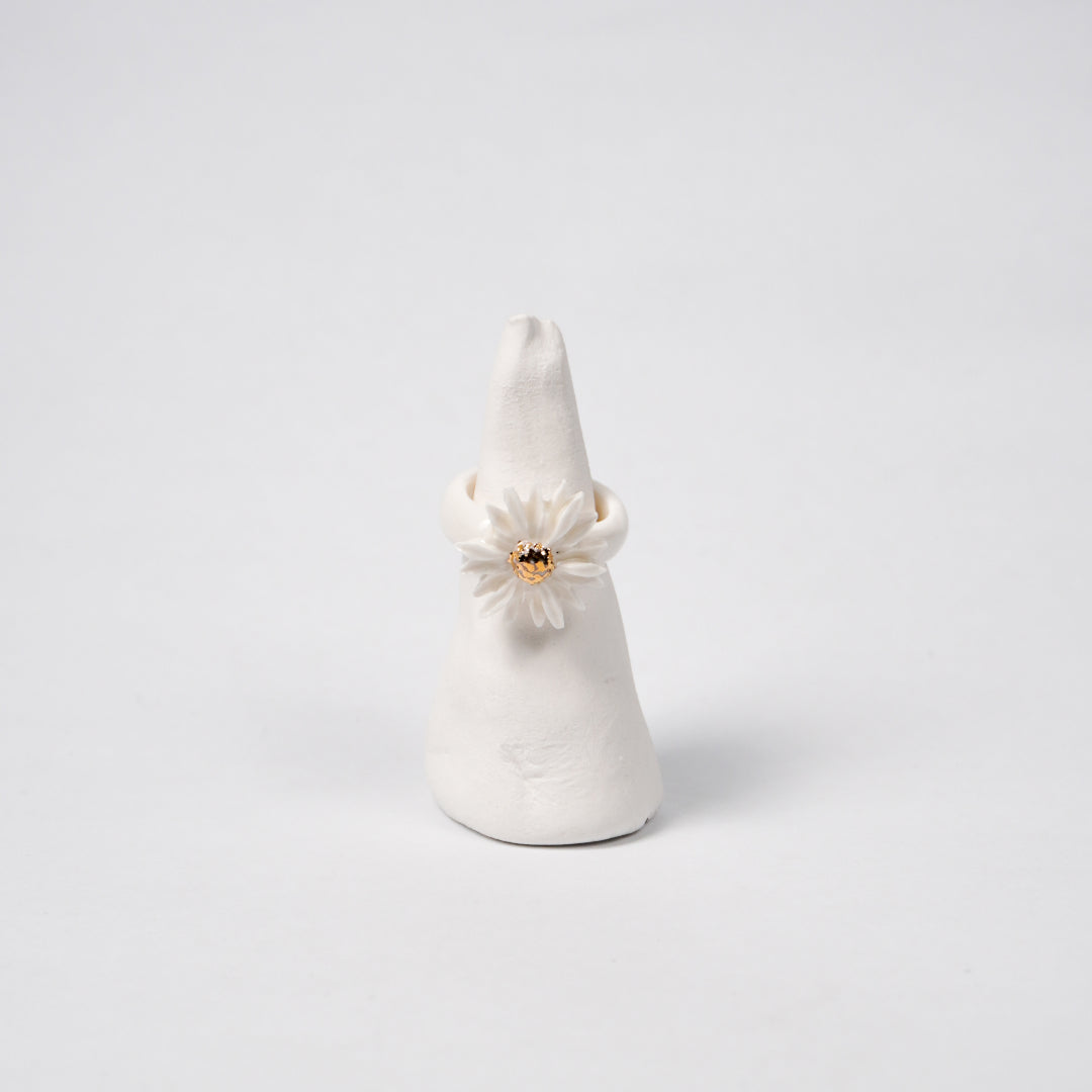 the-endless-flower-garden-blooming-daisy-edition-with-24k-gold-ceramic-ring-Leap-And-Linger-Product-Rings-by-Nomi-Bui-With-Stand-1st-Angle