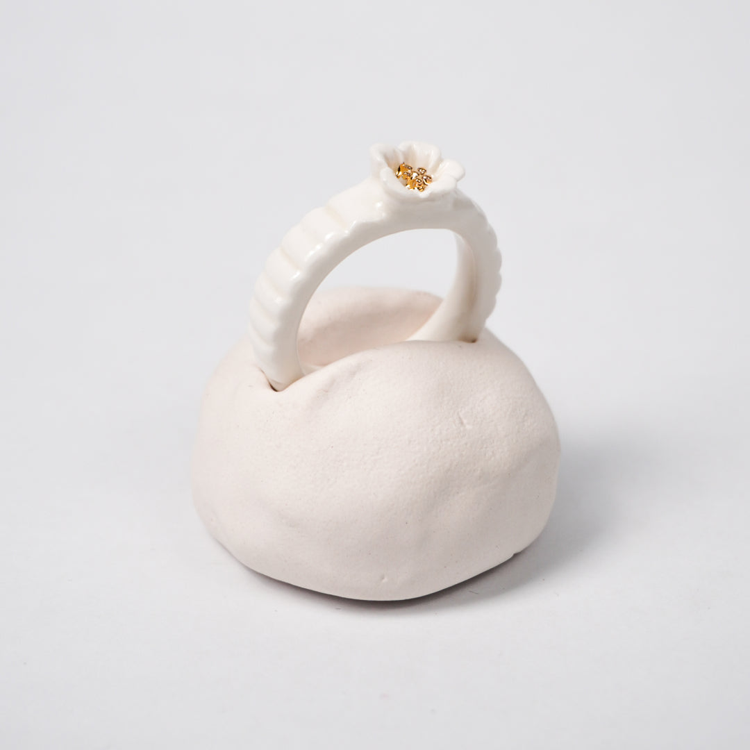 the-endless-flower-garden-delicat-edition-with-24k-gold-porcelain-ring-Leap-And-Linger-Product-Rings-by-Nomi-Bui-With-Hand-1st-Angle
