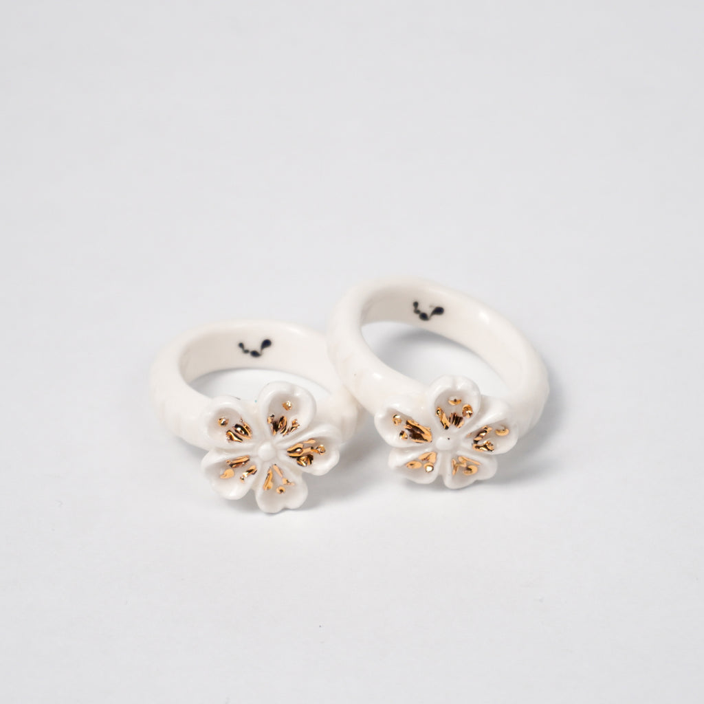 the-endless-flower-garden-fleur-de-pecher-blanche-edition-with-24k-gold-ceramic-ring-Leap-And-Linger-Product-Rings-by-Nomi-Bui-With-5th-Angle