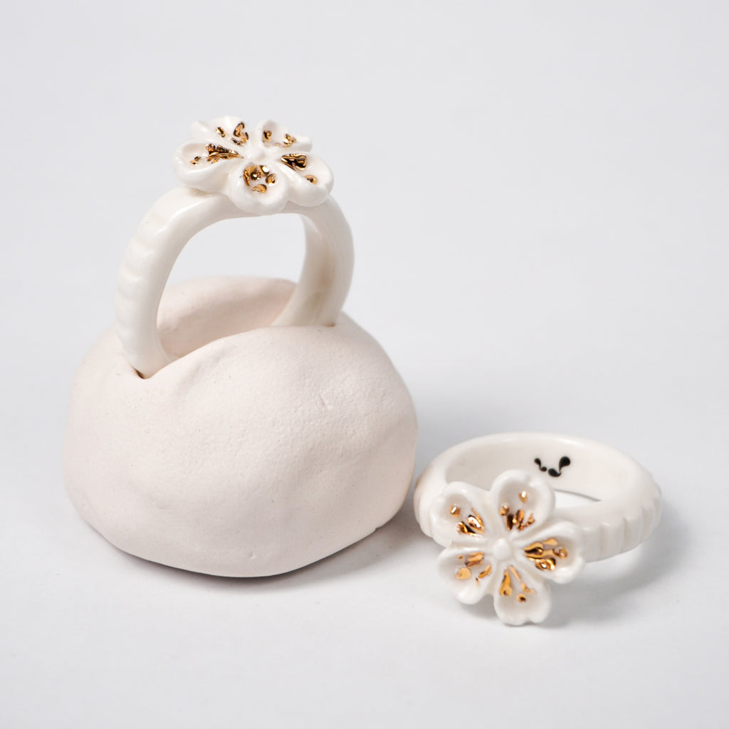 the-endless-flower-garden-fleur-de-pecher-blanche-edition-with-24k-gold-ceramic-ring-Leap-And-Linger-Product-Rings-by-Nomi-Bui-With-Hand-1st-Optional