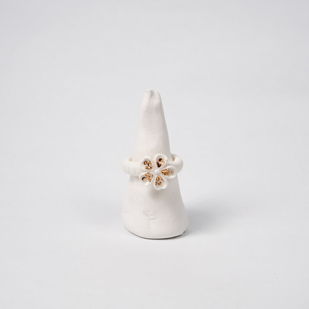 the-endless-flower-garden-fleur-de-pecher-blanche-edition-with-gold-ceramic-ring-Leap-And-Linger-Product-Rings-by-Nomi-Bui-Stand-2nd-Angle