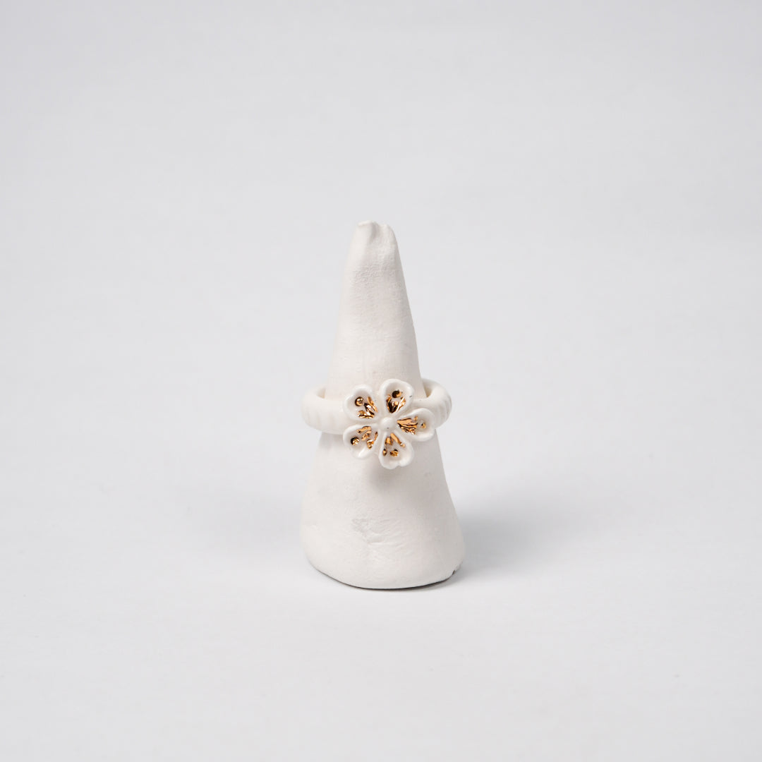 the-endless-flower-garden-fleur-de-pecher-blanche-edition-with-gold-ceramic-ring-Leap-And-Linger-Product-Rings-by-Nomi-Bui-Stand-2nd-Angle