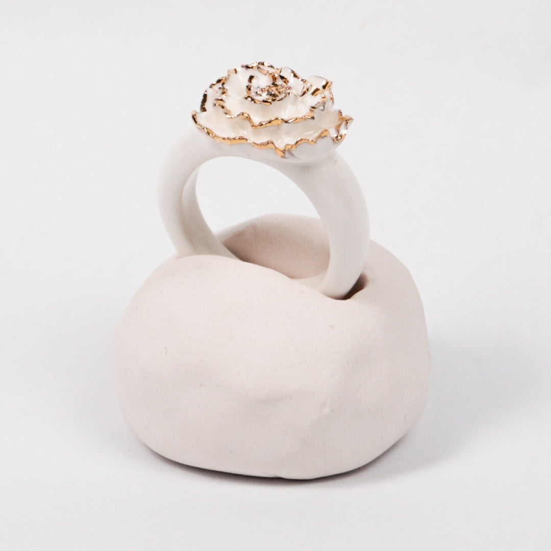 the-endless-flower-garden-mariee-blanche-edition-with-24k-gold-ceramic-ring-Leap-And-Linger-Product-Rings-by-Nomi-Bui-With-Hand-1st-Angle
