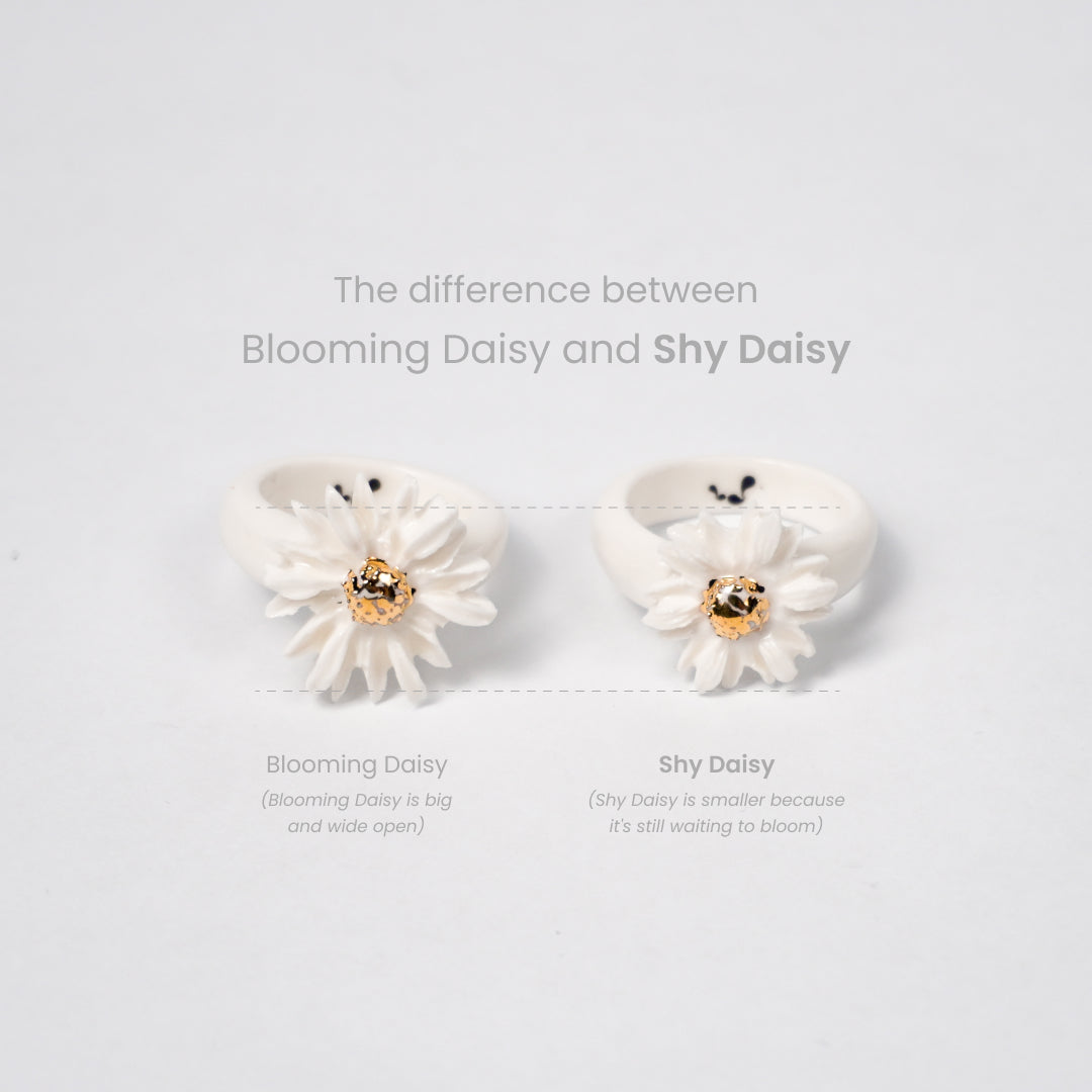 the-endless-flower-garden-shy-daisy-edition-with-24k-gold-ceramic-ring-Leap-And-Linger-Product-Rings-by-Nomi-Bui-With-Hand-1st-Angle