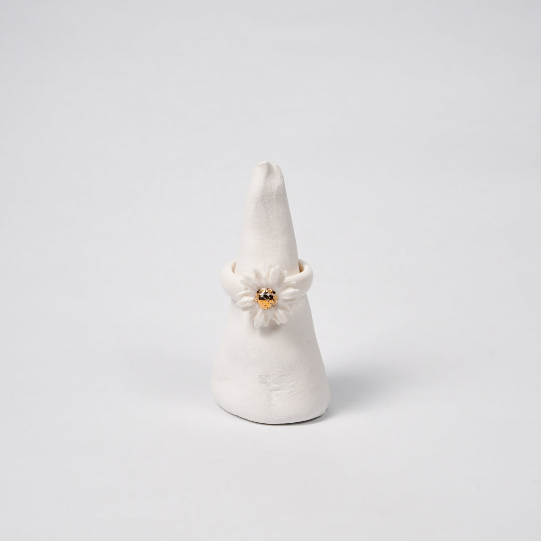 the-endless-flower-garden-shy-daisy-edition-with-24k-gold-ceramic-ring-Leap-And-Linger-Product-Rings-by-Nomi-Bui-With-Stand-1st-Angle