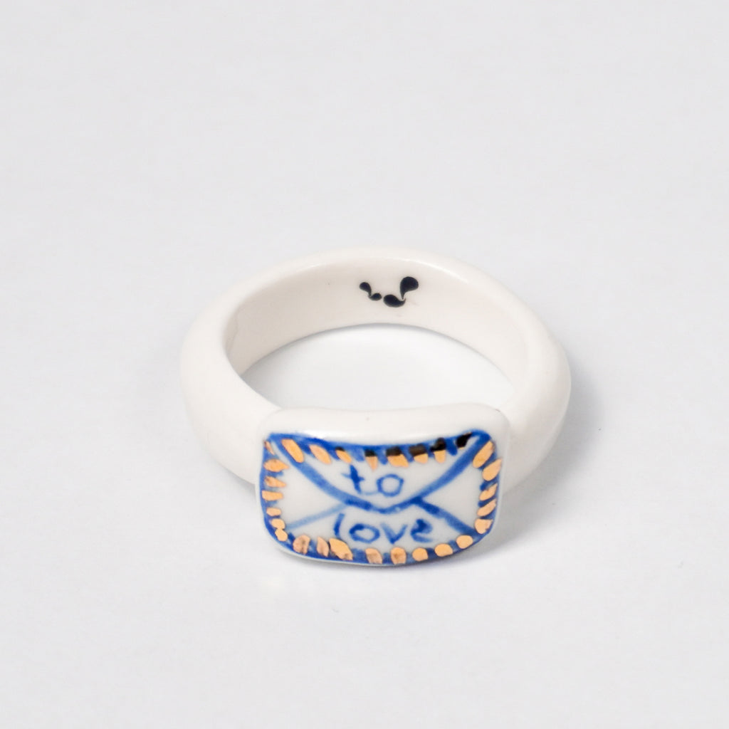 the-notebook-edition-with-24k-gold-porcelain-ring-Leap-And-Linger-Product-Rings-by-Nomi-Bui-1st-Angle