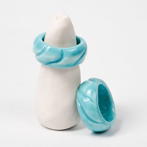 tires-aqua-sky-ceramic-ring-Leap-And-Linger-Product-Rings-by-Nomi-Bui-With-Stand-2nd-Angle