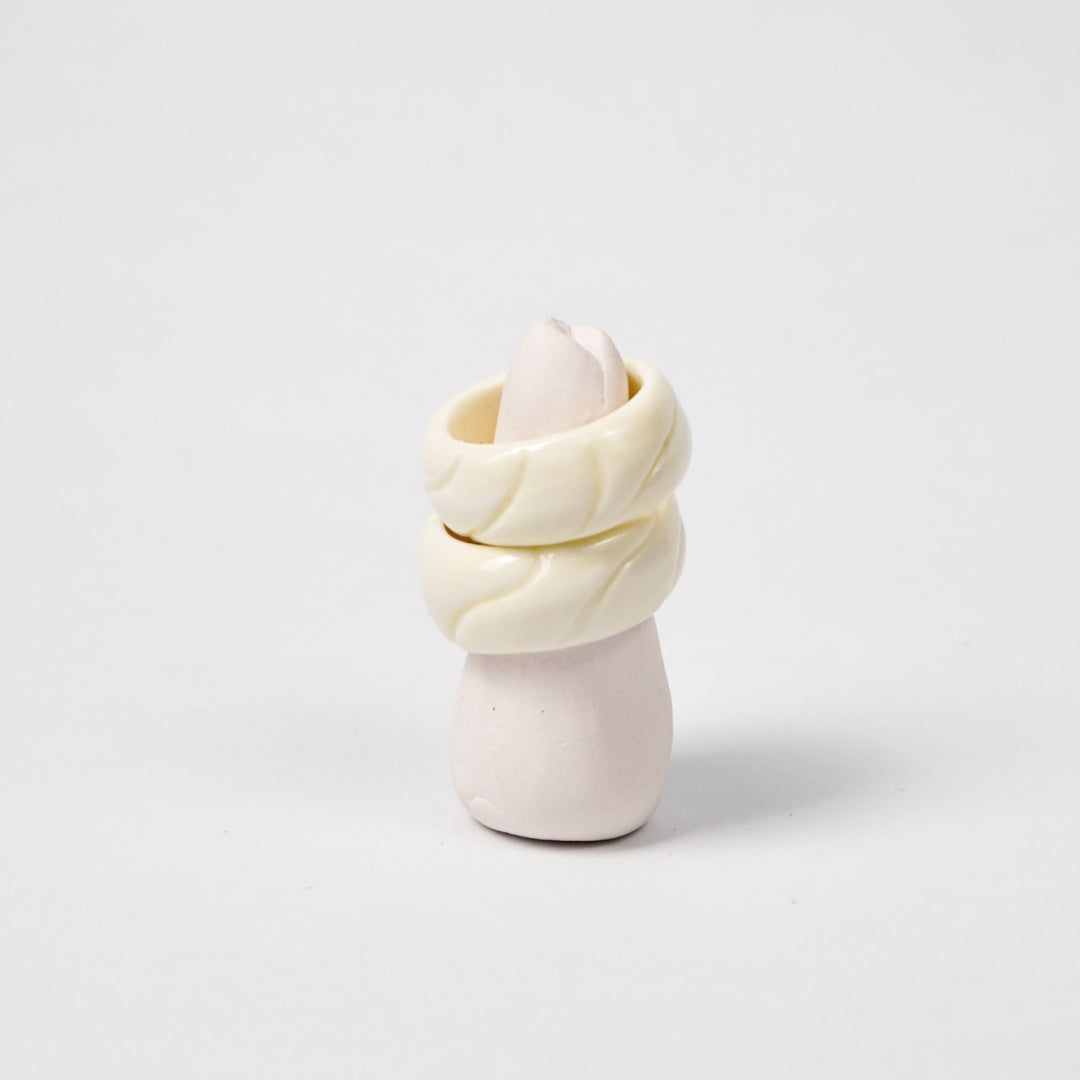 tires-lucent-white-porcelain-ring-Leap-And-Linger-Product-Rings-by-Nomi-Bui-With-Stand-2nd-Angle