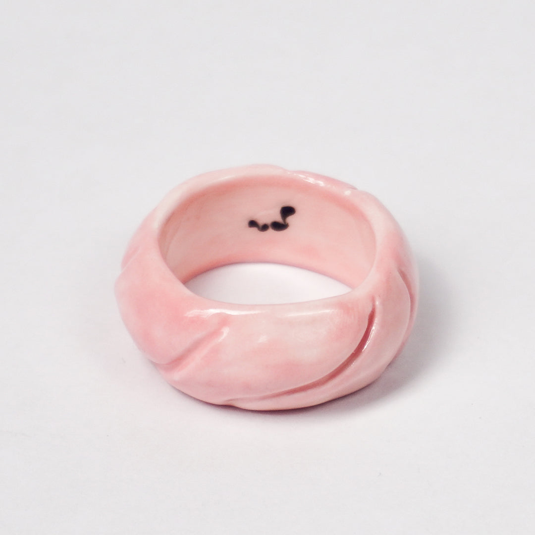 tires-pink-jump-ceramic-ring-Leap-And-Linger-Product-Rings-by-Nomi-Bui-1st-Angle
