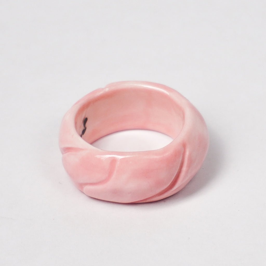 tires-pink-jump-ceramic-ring-Leap-And-Linger-Product-Rings-by-Nomi-Bui-3rd-Angle