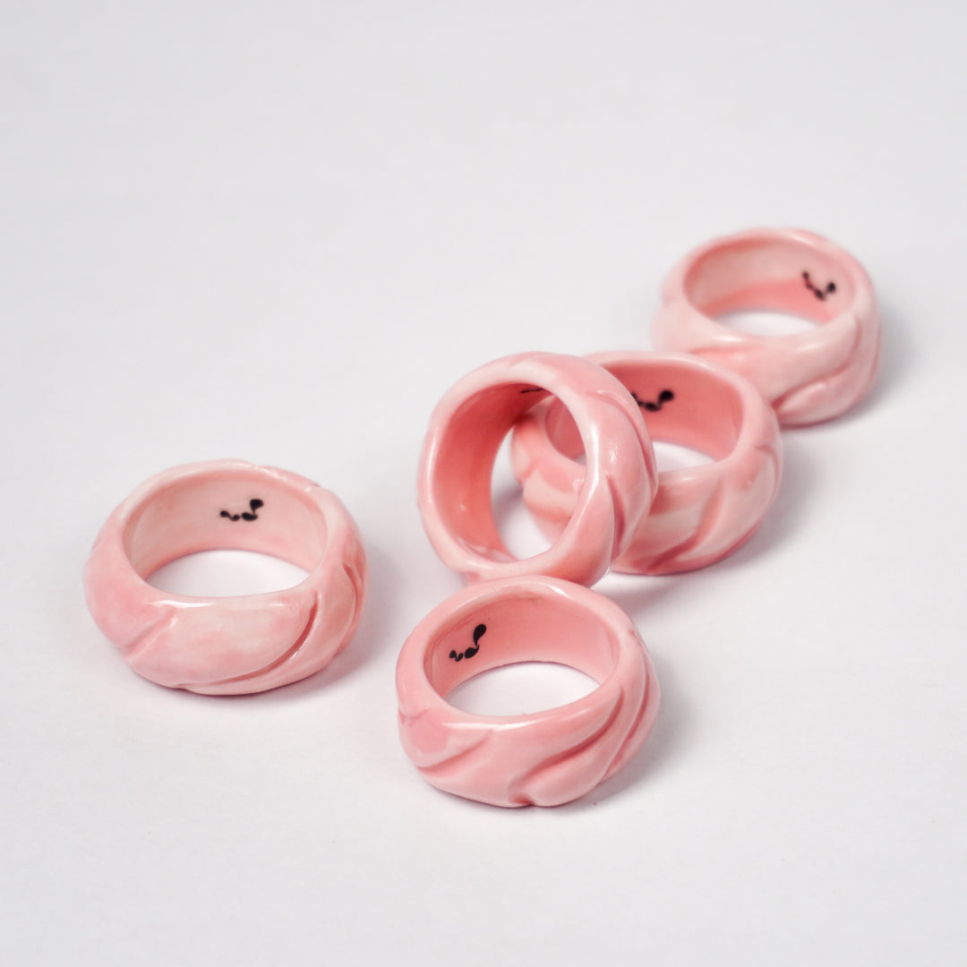 tires-pink-jump-ceramic-ring-Leap-And-Linger-Product-Rings-by-Nomi-Bui-With-Stand-2nd-Angle