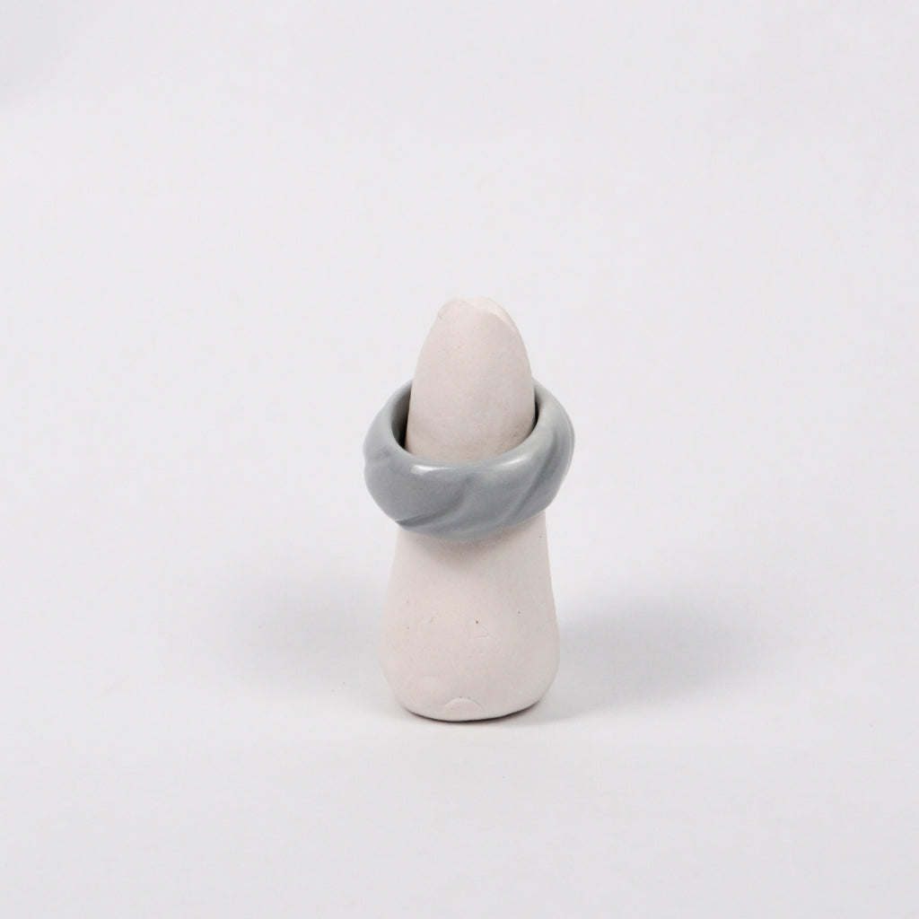 tires-tracing-gray-ceramic-ring-Leap-And-Linger-Product-Rings-by-Nomi-Bui-With-Stand-1st-Angle