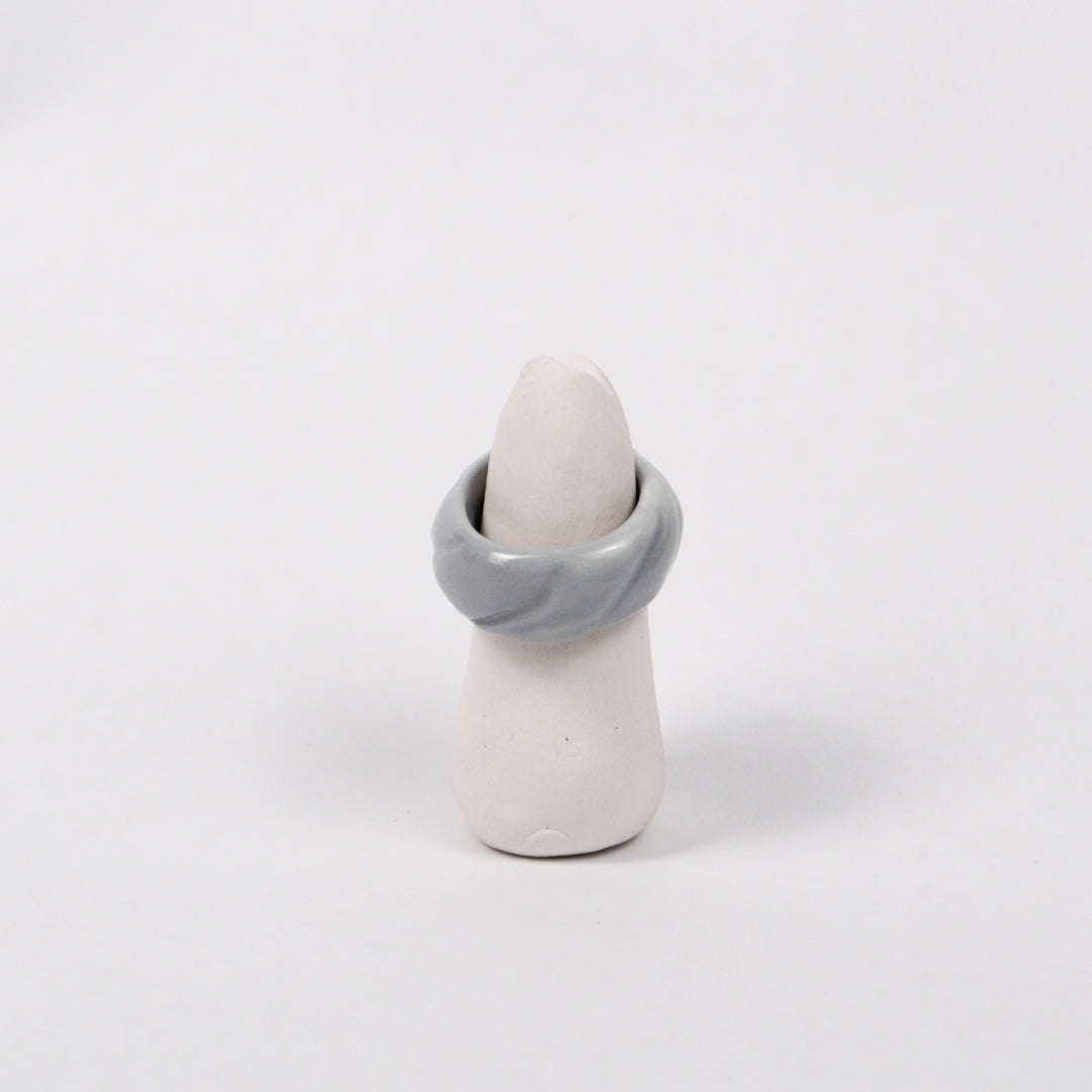 tires-tracing-gray-ceramic-ring-Leap-And-Linger-Product-Rings-by-Nomi-Bui-With-Stand-1st-Angle