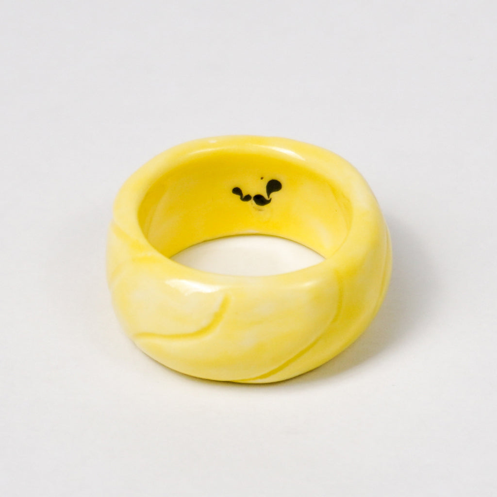 tires-vibrant-yellow-ceramic-ring-Leap-And-Linger-Product-Rings-by-Nomi-Bui-1st-Angle
