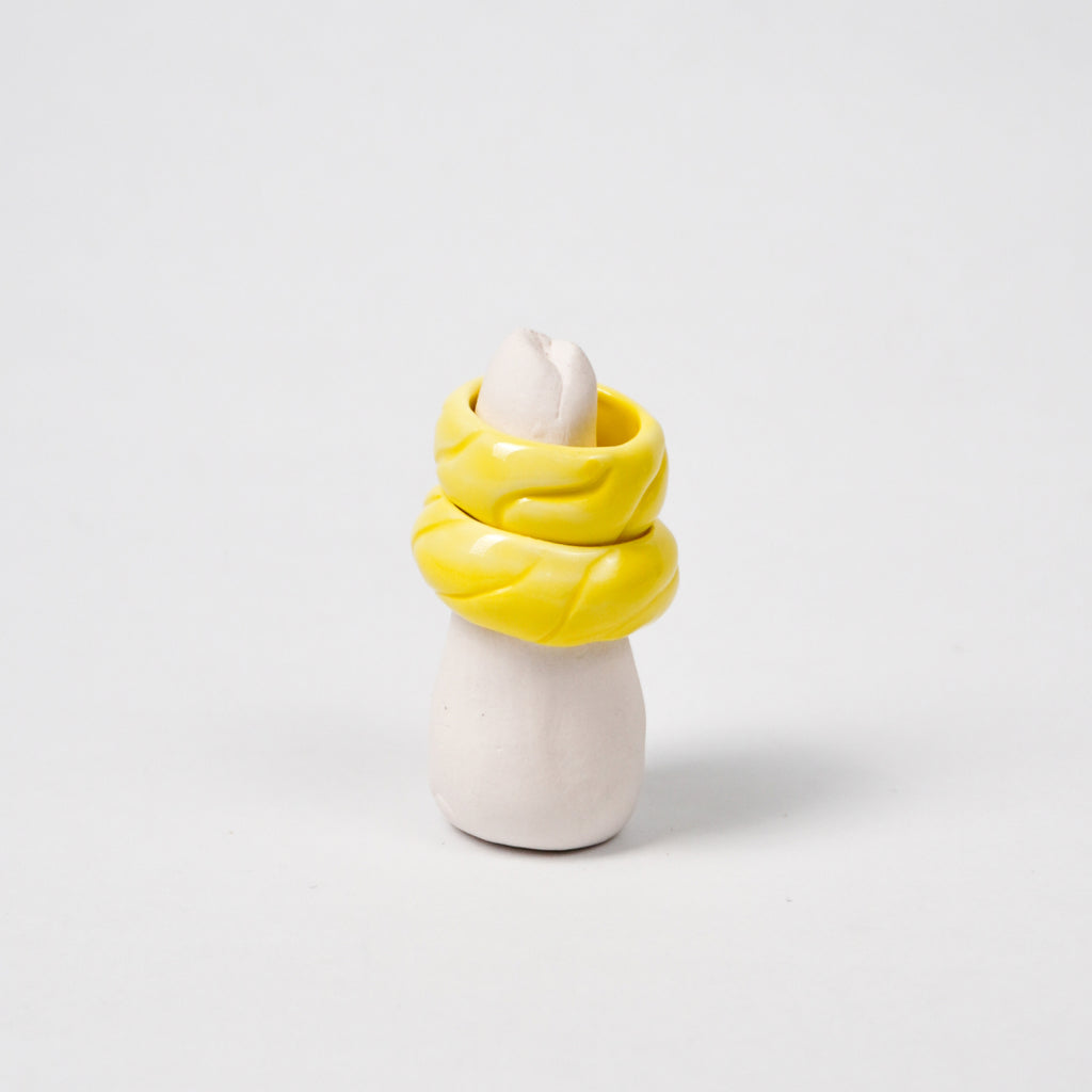 tires-vibrant-yellow-porcelain-ring-Leap-And-Linger-Product-Rings-by-Nomi-Bui-With-Stand-2nd-Angle