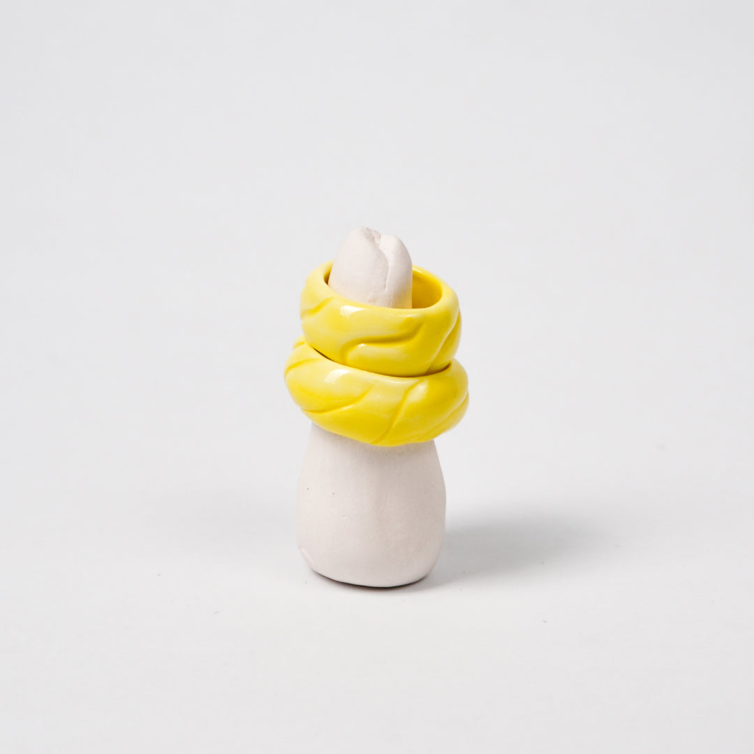 tires-vibrant-yellow-porcelain-ring-Leap-And-Linger-Product-Rings-by-Nomi-Bui-With-Stand-2nd-Angle