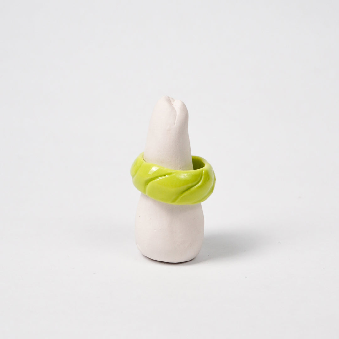 tires-wanderlust-green-ceramic-ring-Leap-And-Linger-Product-Rings-by-Nomi-Bui-With-Stand-1st-Angle