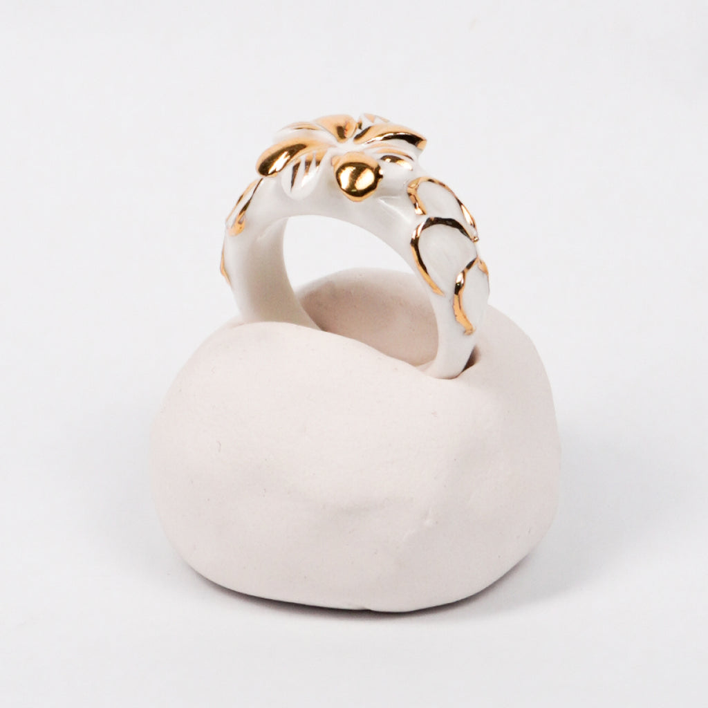 trefle-doux-carambolier-d-or-massif-edition-with-24k-gold-ceramic-ring-Leap-And-Linger-Product-Rings-by-Nomi-Bui-With-Hand-1st-Angle-1