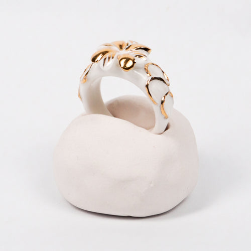 trefle-doux-carambolier-d-or-massif-edition-with-24k-gold-porcelain-ring-Leap-And-Linger-Product-Rings-by-Nomi-Bui-With-Hand-1st-Angle-1