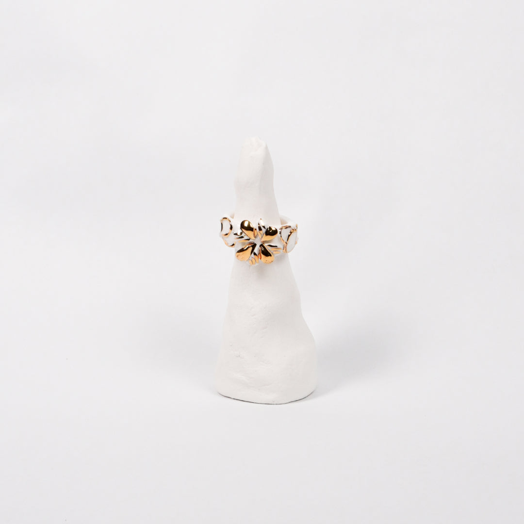 trefle-doux-carambolier-d-or-massif-edition-with-24k-gold-porcelain-ring-Leap-And-Linger-Product-Rings-by-Nomi-Bui-With-Stand-1st-Angle
