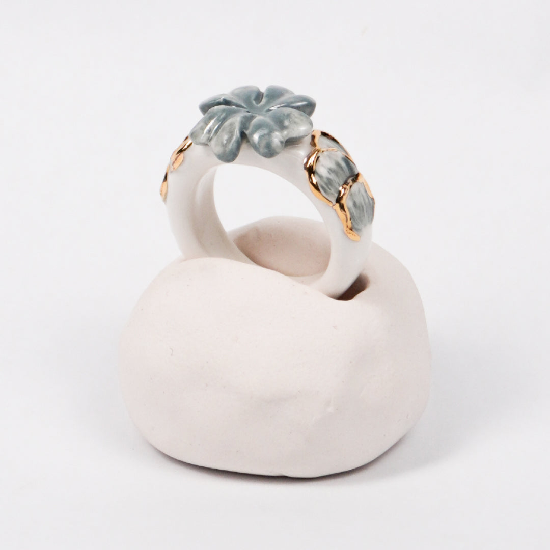 trefle-doux-d-or-edition-with-24k-gold-ceramic-ring-Leap-And-Linger-Product-Rings-by-Nomi-Bui-With-Hand-1st-Angle-2