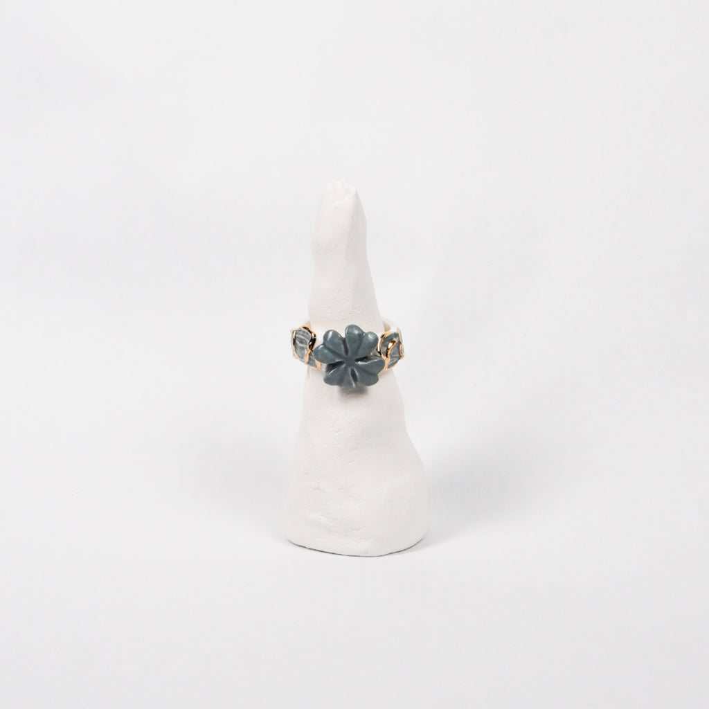 trefle-doux-d-or-edition-with-24k-gold-porcelain-ring-Leap-And-Linger-Product-Rings-by-Nomi-Bui-With-Stand-1st-Angle