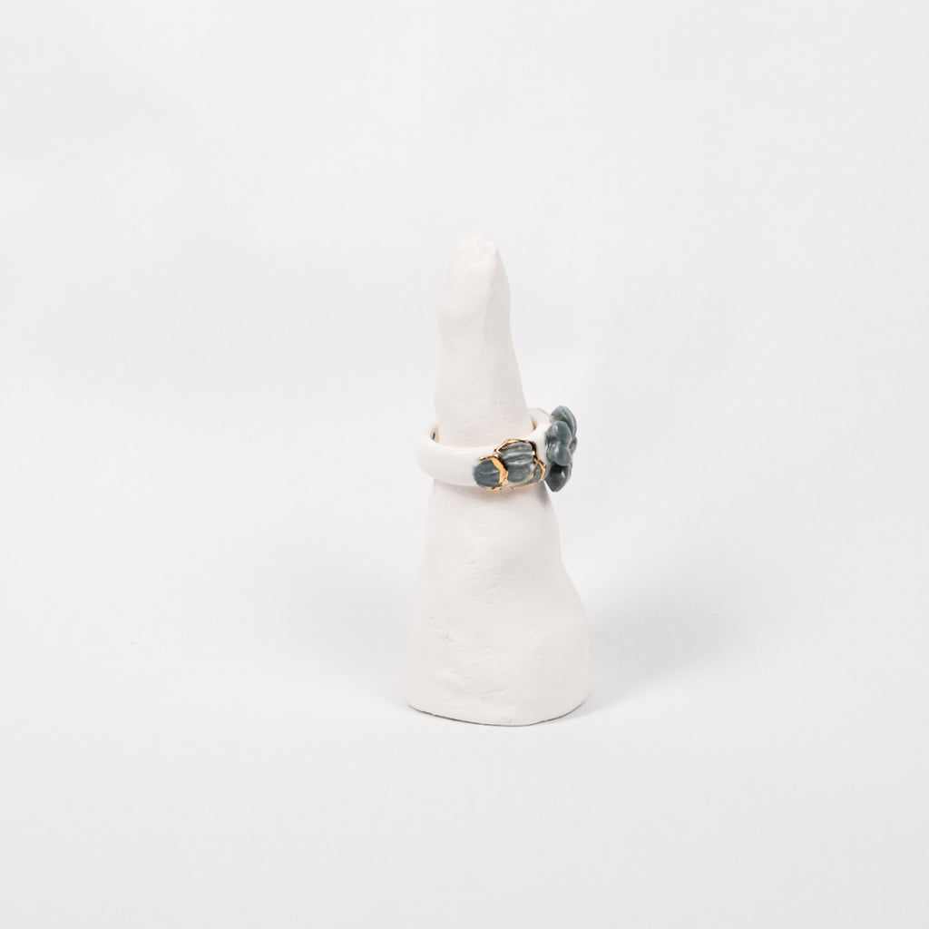 trefle-doux-d-or-edition-with-24k-gold-porcelain-ring-Leap-And-Linger-Product-Rings-by-Nomi-Bui-With-Stand-2nd-Angle