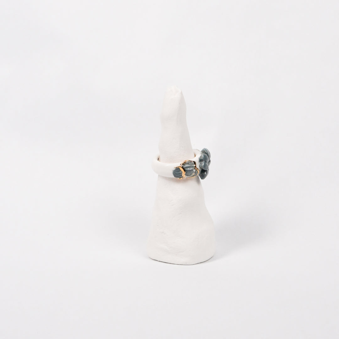 trefle-doux-d-or-edition-with-24k-gold-porcelain-ring-Leap-And-Linger-Product-Rings-by-Nomi-Bui-With-Stand-2nd-Angle