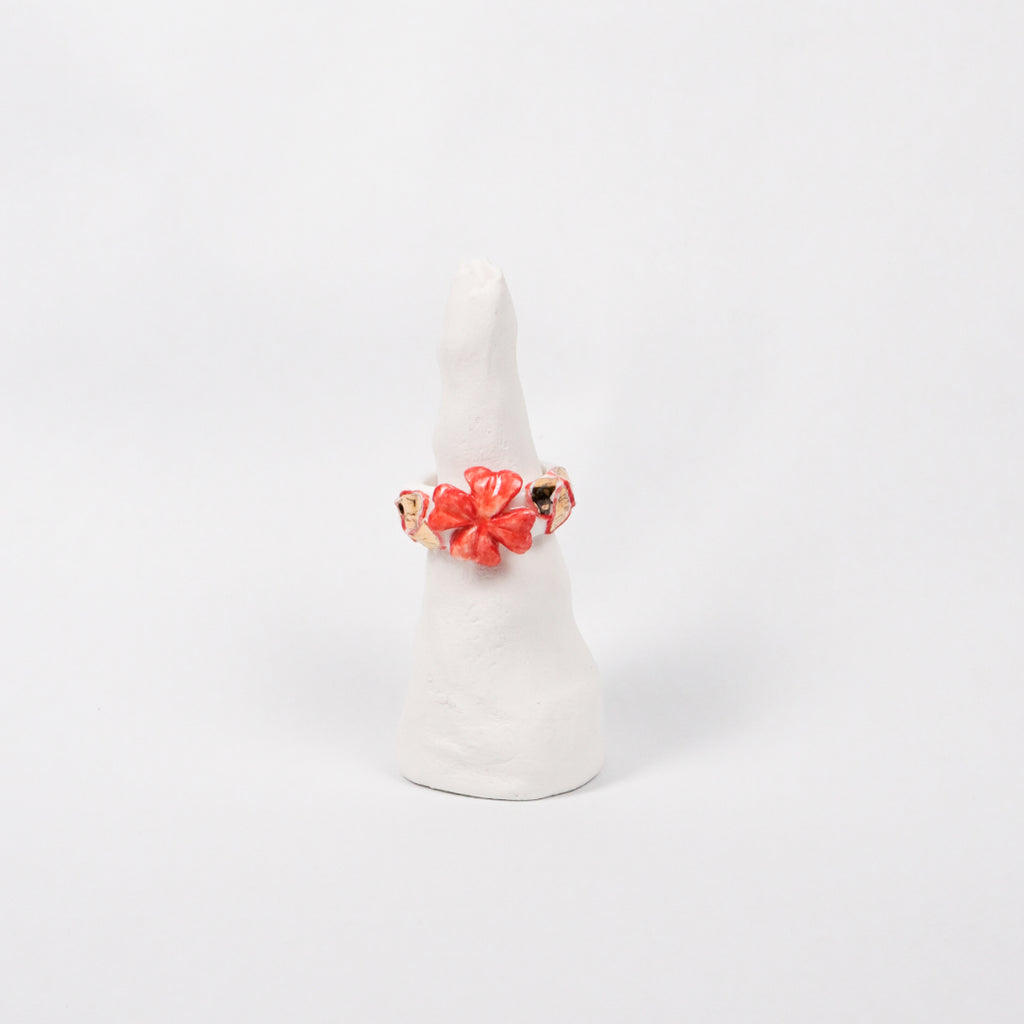 trefle-doux-le-phenix-en-flammes-edition-with-24k-gold-ceramic-ring-Leap-And-Linger-Product-Rings-by-Nomi-Bui-With-Stand-1st-Angle