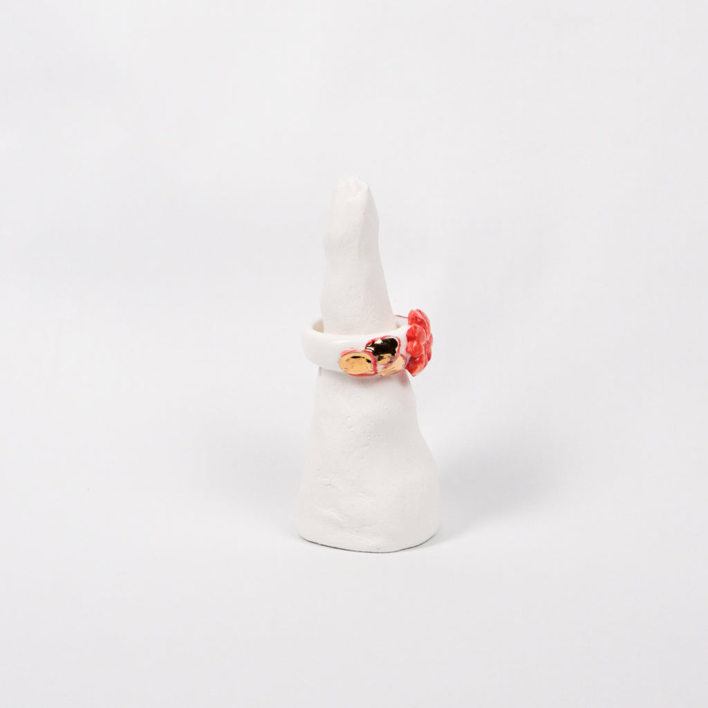 trefle-doux-le-phenix-en-flammes-edition-with-24k-gold-ceramic-ring-Leap-And-Linger-Product-Rings-by-Nomi-Bui-With-Stand-2nd-Angle