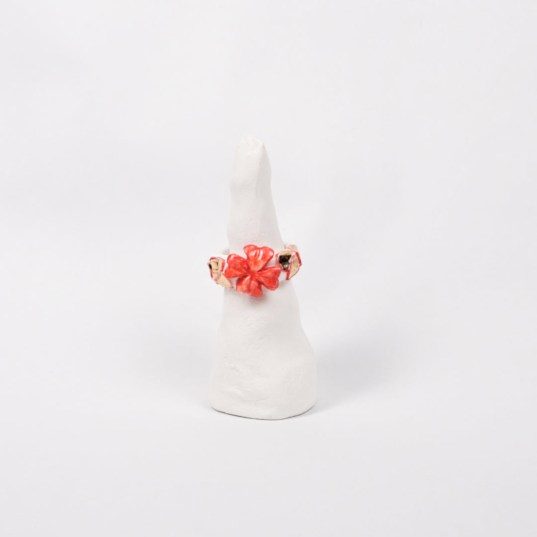 trefle-doux-le-phenix-en-flammes-edition-with-24k-gold-porcelain-ring-Leap-And-Linger-Product-Rings-by-Nomi-Bui-With-Stand-1st-Angle