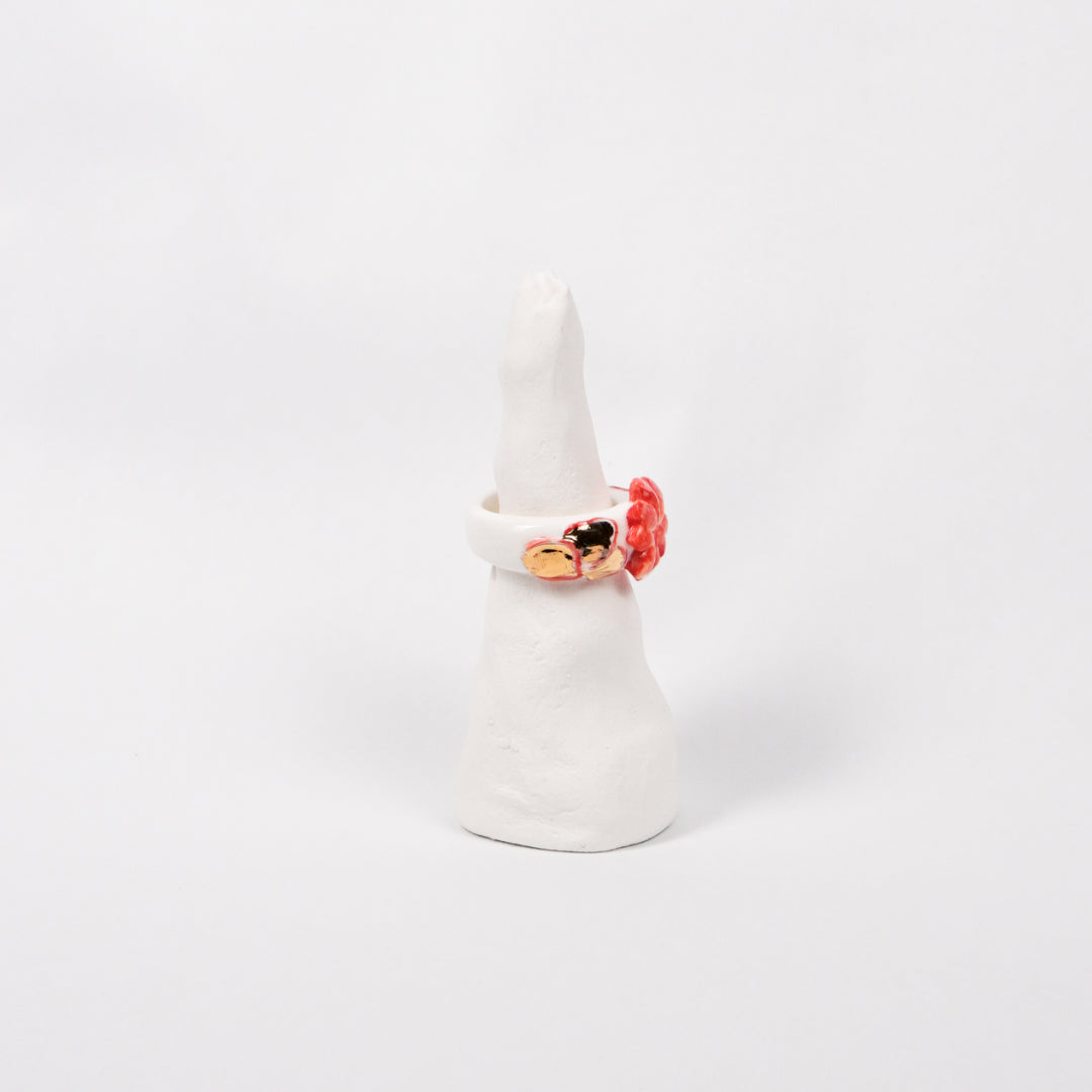 trefle-doux-le-phenix-en-flammes-edition-with-24k-gold-porcelain-ring-Leap-And-Linger-Product-Rings-by-Nomi-Bui-With-Stand-2nd-Angle