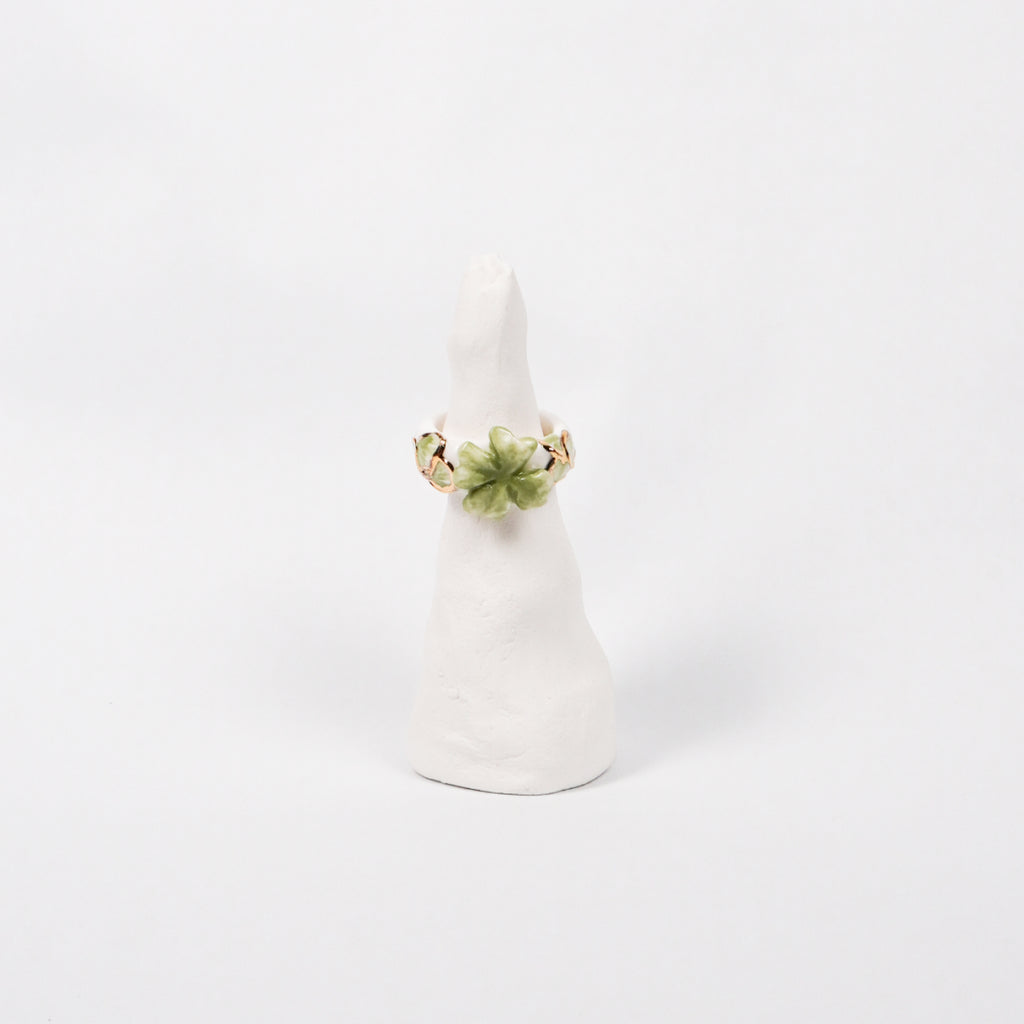 trefle-doux-princesse-edition-with-24k-gold-ceramic-ring-Leap-And-Linger-Product-Rings-by-Nomi-Bui-With-Stand-1st-Angle