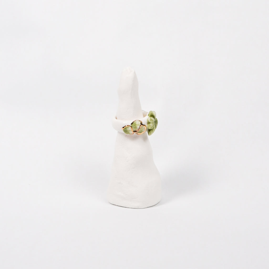 trefle-doux-princesse-edition-with-24k-gold-ceramic-ring-Leap-And-Linger-Product-Rings-by-Nomi-Bui-With-Stand-2nd-Angle