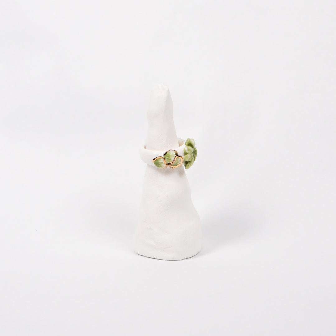 trefle-doux-princesse-edition-with-24k-gold-ceramic-ring-Leap-And-Linger-Product-Rings-by-Nomi-Bui-With-Stand-2nd-Angle